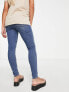 ASOS DESIGN Maternity ultimate skinny jeans in authentic mid blue with under the bump waistband