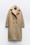 Extra-long faux shearling coat