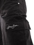 Sean John script logo wide leg cargo trousers in black with front hem split