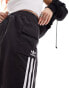 adidas Originals three stripe cargo shorts in black