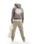 Фото #1 товара The Couture Club blurred emblem graphic hoodie in brown