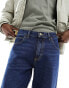 Lee Oscar relaxed tapered fit jeans in blue nostalgia dark wash