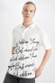 Фото #1 товара Поло футболка defacto Boxy Fit Polo из хлопкового поло, с принтом на горловине