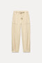 STRAIGHT-LEG TROUSERS WITH BUTTONED HEM