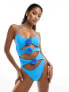 Candypants cut out swimsuit in baby blue with flower corsage detail