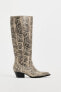 Snakeskin print cowboy boots