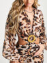 ASOS DESIGN cut out plunge jumpsuit with raffia buckle in leopard print