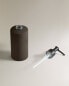 Dark metal bathroom soap dispenser