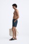 Check-texture weave swimming trunks