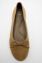 Split leather ballet flats with bow