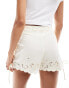 Reclaimed Vintage mini shorts with embroidery and tie up detail in ivory