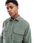 ASOS DESIGN cord overshirt in green