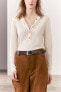 Plain fine knit sweater with buttons