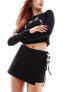 COLLUSION low rise wrap skort with tie detail in black