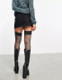 COLLUSION zip detail mini skirt in black