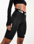 Фото #1 товара The North Face Training Aracar high waist legging shorts in black Exclusive at ASOS