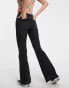 Stradivarius Tall low rise flare jean in black