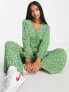 Glamorous Petite v-neck button front jumpsuit in green mini daisy print