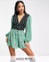 Фото #1 товара ASOS DESIGN Petite bubble crepe plunge neck playsuit with puff sleeve in mixed print