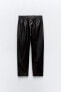 Faux leather jogging trousers