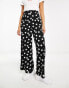 Фото #1 товара Wednesday's Girl polka dot wide leg trousers in black