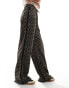 Monki drawstring wide leg trousers in brown snake print with black side stripe detail