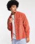 ASOS DESIGN 90s oversized cord shirt in vintage washed rust