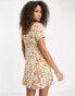 ASOS DESIGN button detail triangle cut out mini tea dress in white base multi floral print