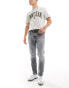 Tommy Jeans Austin slim tapered jeans in dark wash