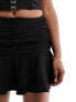 Extro & Vert flippy mini skirt in black