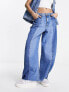 Фото #1 товара Wrangler cowboy fit jeans in mid blue
