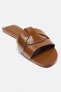 Фото #5 товара Босоножки кожаные на плоской подошве с перекрещивающимися ремешками ZARA