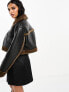 Фото #5 товара ASOS DESIGN cropped bonded borg shacket in black with contrast brown borg