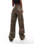 Фото #9 товара ASOS DESIGN mid rise baggy boyfriend jeans in metallic leopard print