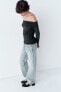 Asymmetric draped top