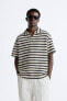 Striped textured polo shirt