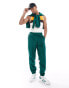 Фото #1 товара adidas Original 80s woven trackpants in collegiate green