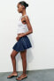 Trf denim box pleat skirt