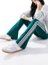 Фото #3 товара adidas Originals three stripe flared leggings in collegiate green