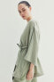 Фото #1 товара Одежда для беременных H&M Блуза на запах с поясом