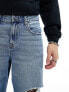 Фото #11 товара ASOS DESIGN baggy jeans with with rips in mid wash blue