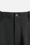 PLEATED CARGO TROUSERS