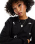 ASOS DESIGN oversized sweatshirt with bows in black