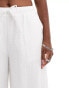 Labelrail x Olivia Grace Herring wide leg low rise textured trousers in white