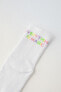Pack of three pairs of long striped and slogan socks