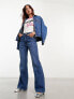 Фото #1 товара Wrangler Barbie co-ord flared jeans in mid blue