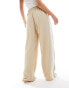 Фото #3 товара River Island Petite wide leg jogger trouser with side stripe in beige