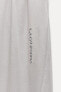 MINIMALIST SLOGAN WIDE-LEG TROUSERS