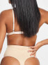 Bye Bra invisible mid waist shaping thong in beige