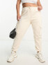 Фото #2 товара River Island Plus cargo trouser with pocket detail in beige